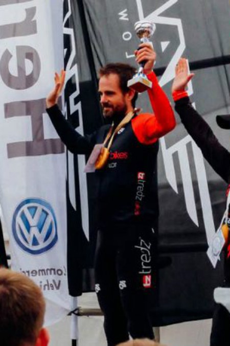 Scott on the podium celebrating finishing in the top 3